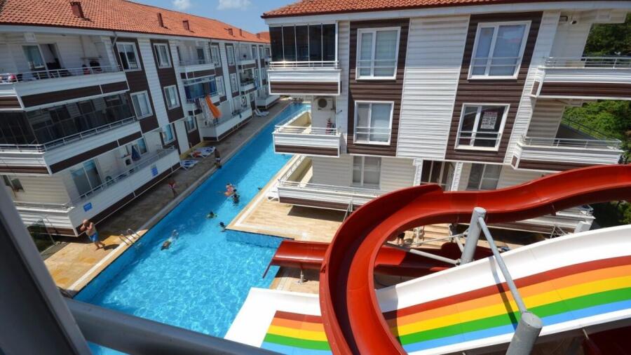 OTEL TADINDA TATİL KEYFİ...AQUA PARKLI SİTEDE 3.KAT 1+1